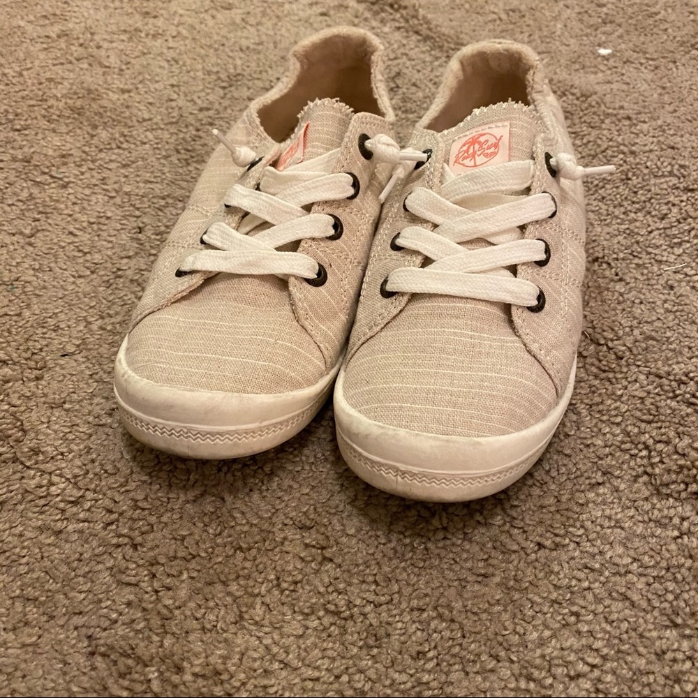 Cream colored slip on shoes